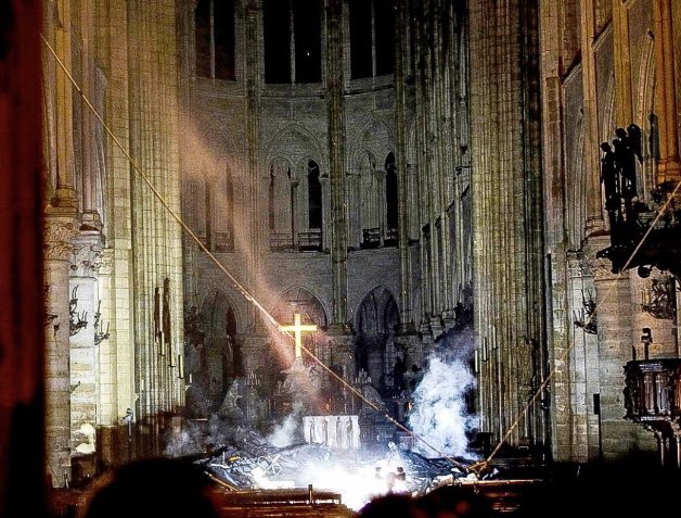 cassopatra's tweet photo. “Hold the cross high so I can see it through the flames.” -St. Joan of Arc

I have chills. 

#NotreDame https://t.co/iXnWgOgFZC