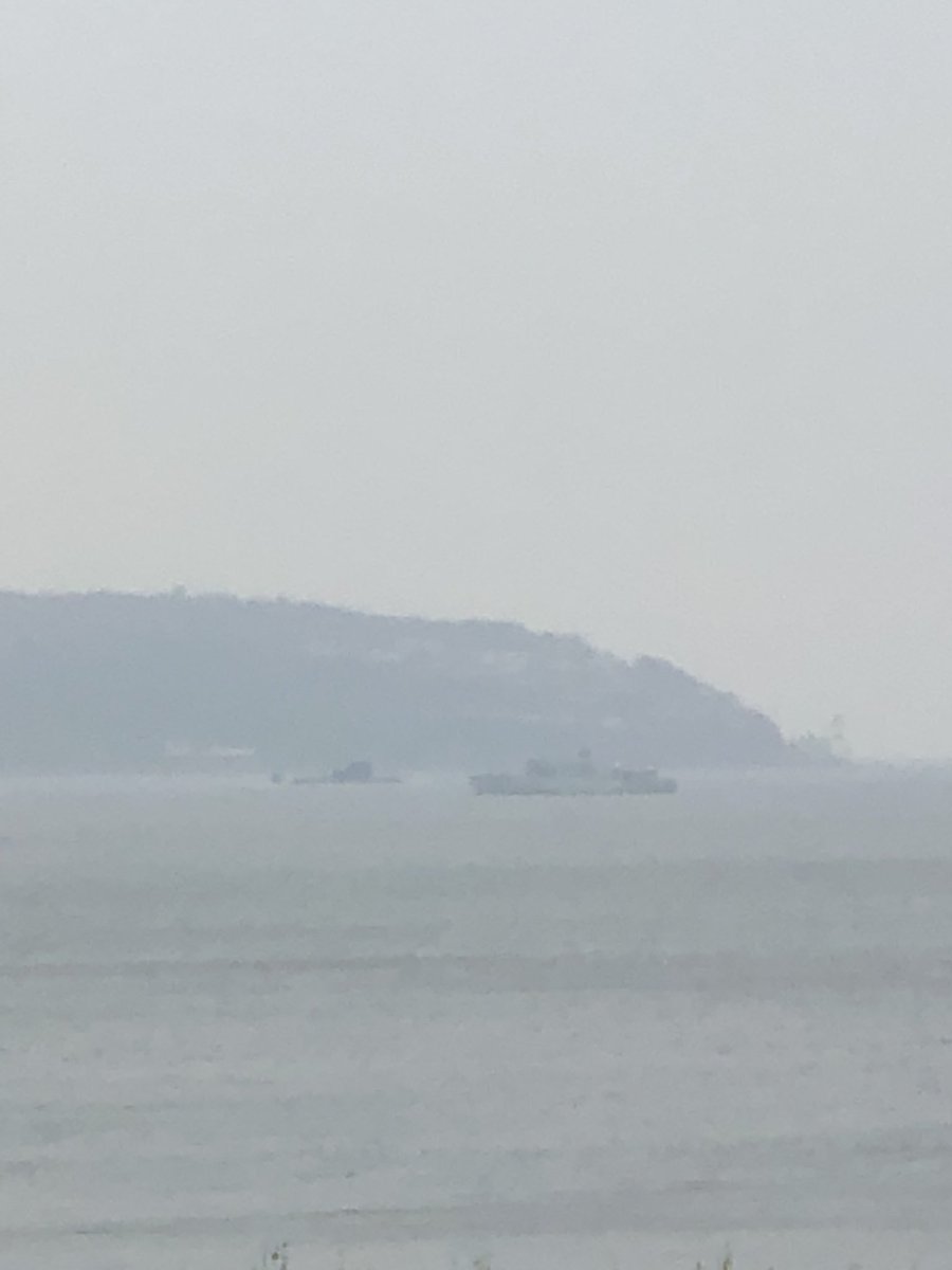 ArgyllSeaGlass's tweet photo. Another submarine in the distance, on a misty and rainy #Clyde passing #ClochPoint & #HMSMiddleton #RoyalNavy @HMSMiddleton @UKDefJournal @NavyLookout https://t.co/wyDWfiT3Ze