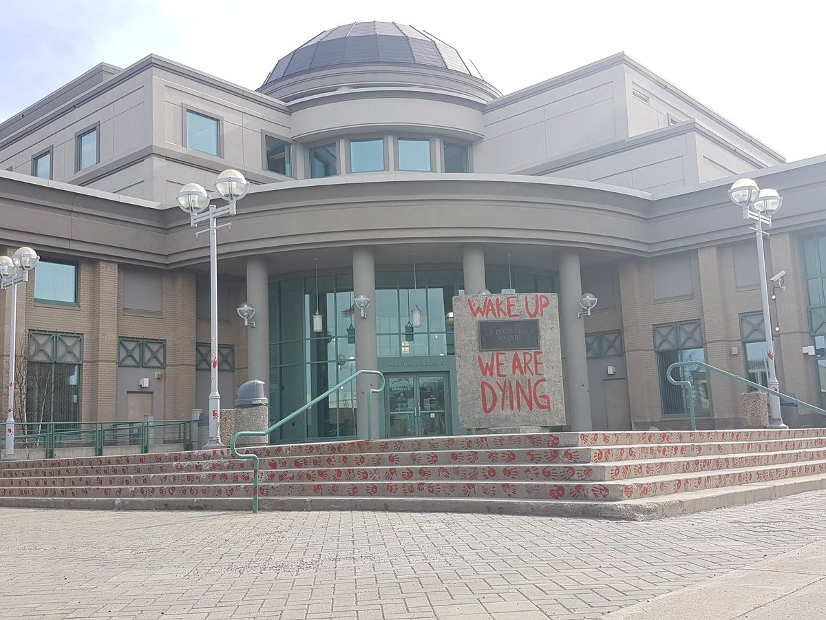 akurjata's tweet photo. Prince George Courthouse. Today is the National Day of Action on the Overdose Crisis. Officer in the scene just told me this is vandalism. #cityofPG https://t.co/KH2vWWet8Y