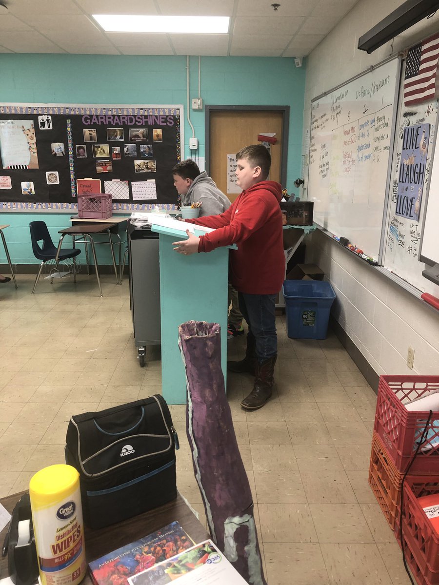 MrsAtallah215's tweet photo. Students leading the discussion on what an exemplary short answer looks like based on a rubric! So proud of these boys! @amyharlan9382 thanks for letting me borrow the boys for a little while. #LearningvsTeaching #GarrardShines https://t.co/z6uY5QXZJq