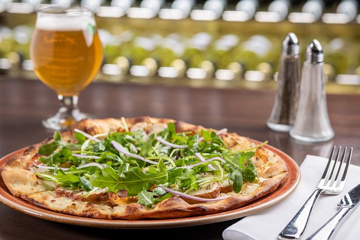 Rosemary potato, prosciutto, bechamel sauce, arugula and bocconcini make up our irresistible Prosciutto &amp; Potato Pizza! Available for lunch or dinner 🍕🍻
.
.
.
.
.
#pizza #potatolover #lunchtime #604eats #westcoastdining #tsawwassen