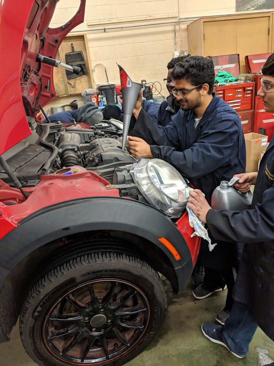 MsJLee12's tweet photo. Rosie the mini Cooper in the #TFSSautoshop getting her oil changed by our Grade 11 Transportation students @SHSMPeel #TFSSfam #SHSMtransportation #teamwork #havingfunlearning https://t.co/gkx7Bc2kZH