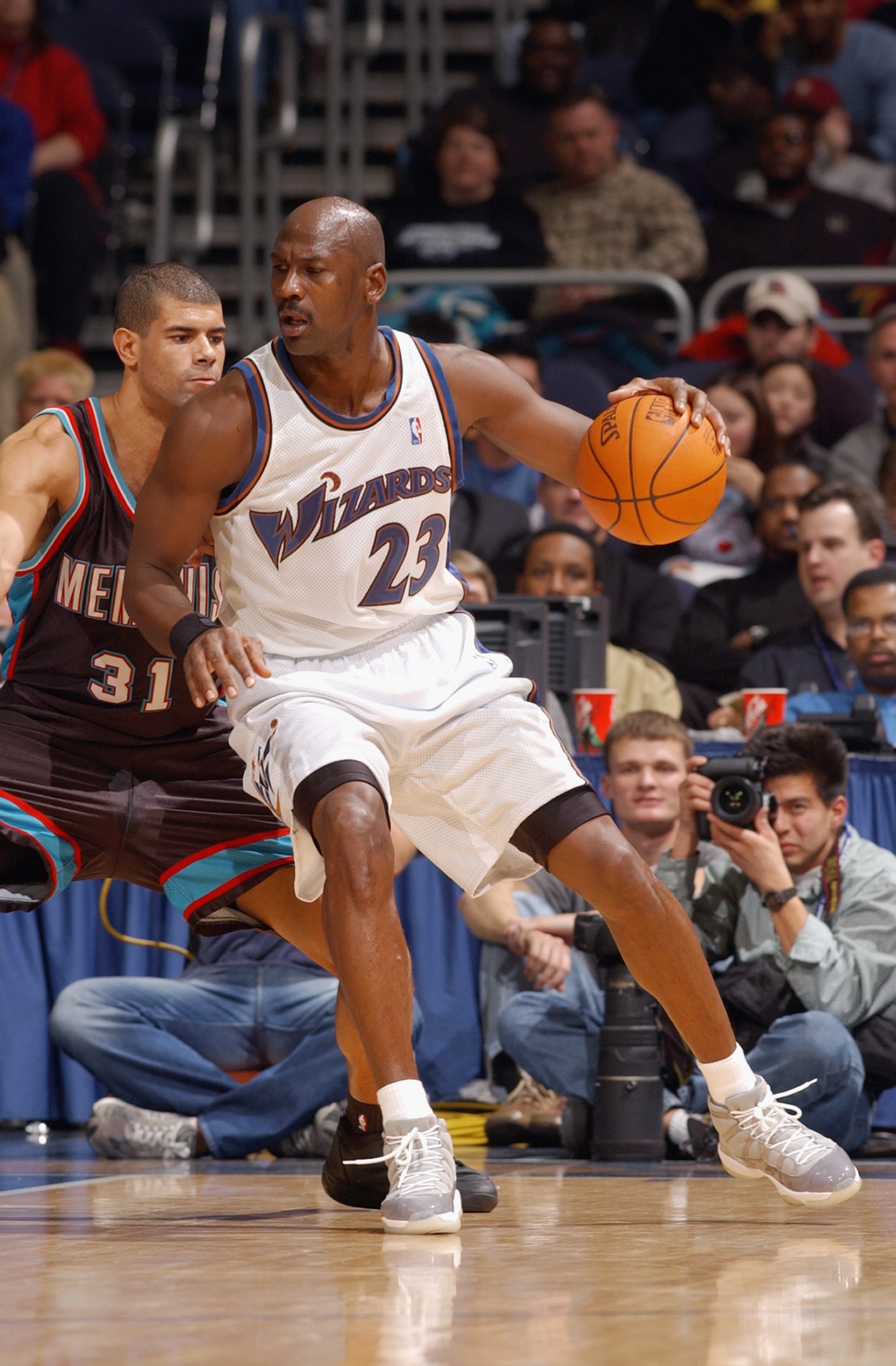 Michael Jordan wearing Cool Grey Nike Air Jordan 11 (XI