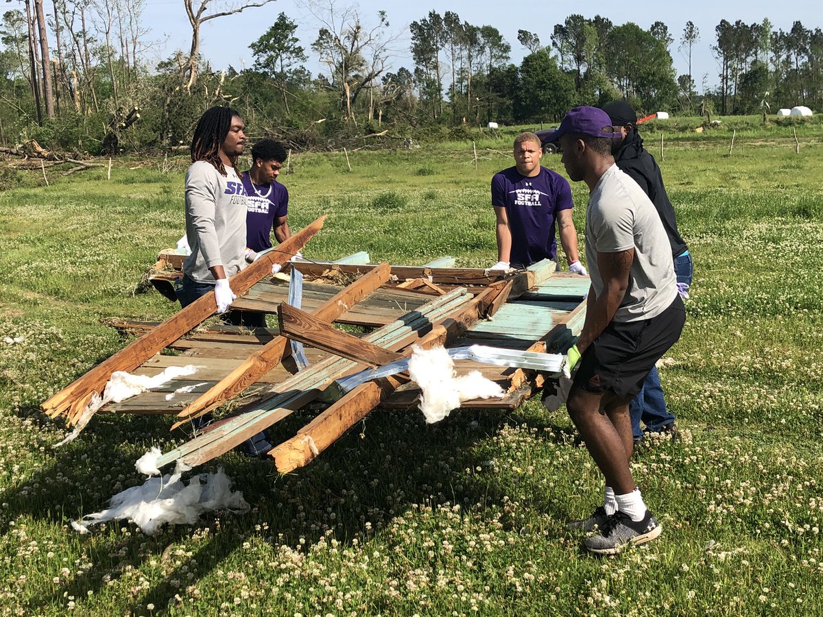 SFA_Football's tweet photo. .@CoachCarthel and the ‘Jacks have cancelled all football activities today to assist with the with cleanup efforts in Alto. 

#AxeEm | #BelieveInTheVision https://t.co/ws1p0RRqRJ