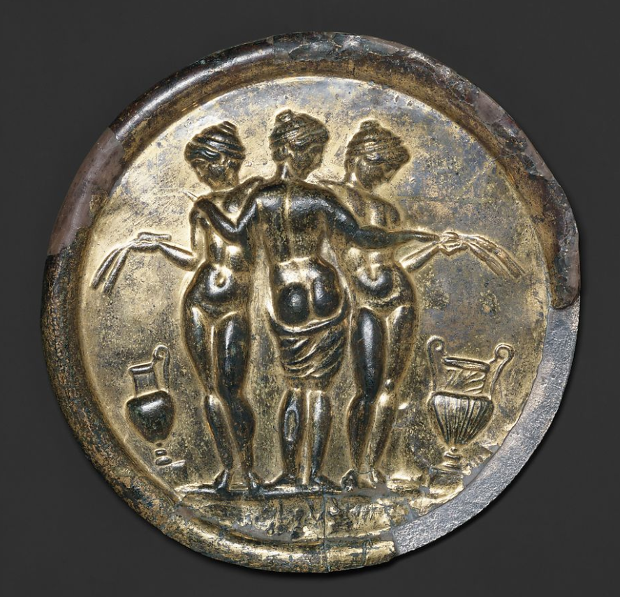 ExploreClassics's tweet photo. Gilded bronze mirror with the Three Graces, mid-2nd century AD, @metmuseum in Gallery 168. https://t.co/UFVxzlqTAN