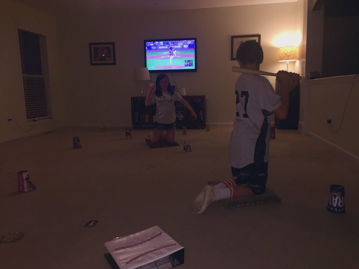 shoemake_laina's tweet photo. Had to move furniture in preparation for carpet cleaning. The kids took the opportunity to play baseball in the living room while watching baseball in the background. #AlwaysBaseball https://t.co/iGdeBSAG1f
