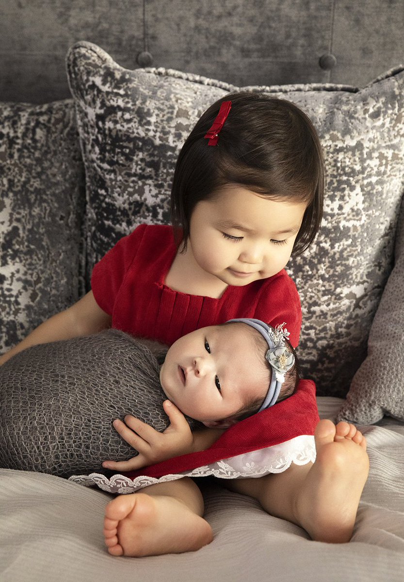 Emma already has this big sister gig figured out!