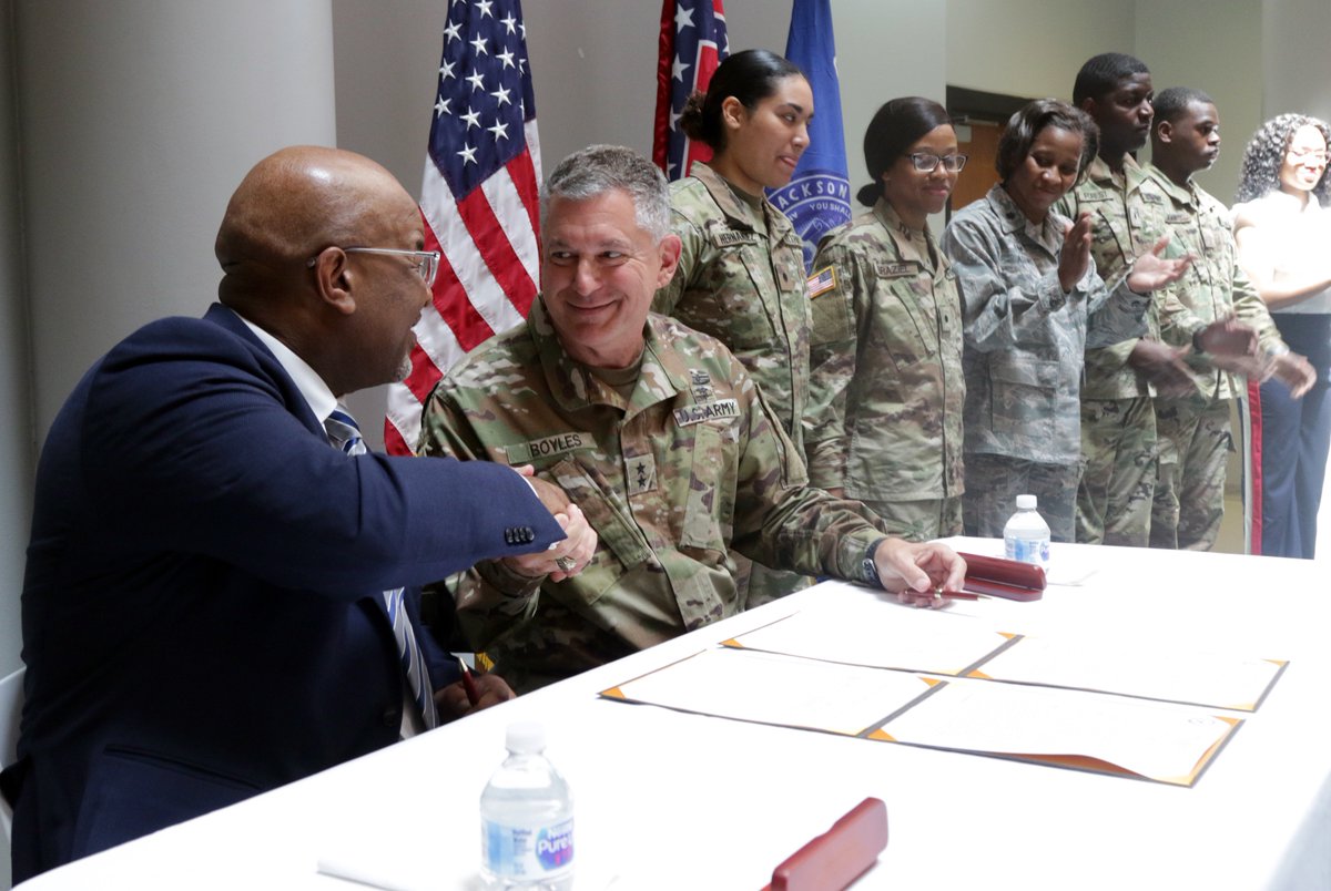 nationalguardMS's tweet photo. Jackson State University President William B. Bynum, Jr. and MG Janson D. Boyles, TAG-MS, shake hands after signing a memorandum of understanding, April 16, 2019, on the JSU campus. The agreement allows eligible MSNG service members to receive free tuition at JSU! https://t.co/uDfqKIJ8yv