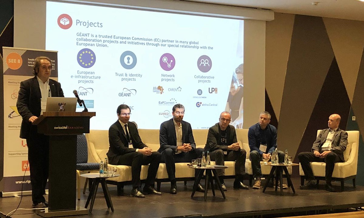 _GeriPetrova's tweet photo. A great line up for the #NREN panel at #SEE8. Soon about to hear from panelists from University of Zenica, University of Sarajevo, University of Mostar, University of Skopje as well as CARNET and GRNET. (On the photo Anastas Mishev talks about @GEANTnews 's work). https://t.co/v3wYvHrMmr