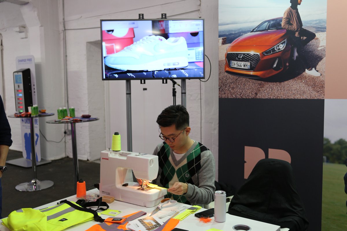 BraveBisonIO's tweet photo. Day 1 at #YMS19 was brilliant! 

Big thanks to Johnson Wong, founder of @AFTERWORKUK for joining us on our stand. Along with #Mutha's Sasha &amp; Obi, Johnson upcycled disused high vis jackets into cool luggage tags and the response was phenomenal! 

We're back today, at stand 19! 👍 https://t.co/nJFDkhxuxU