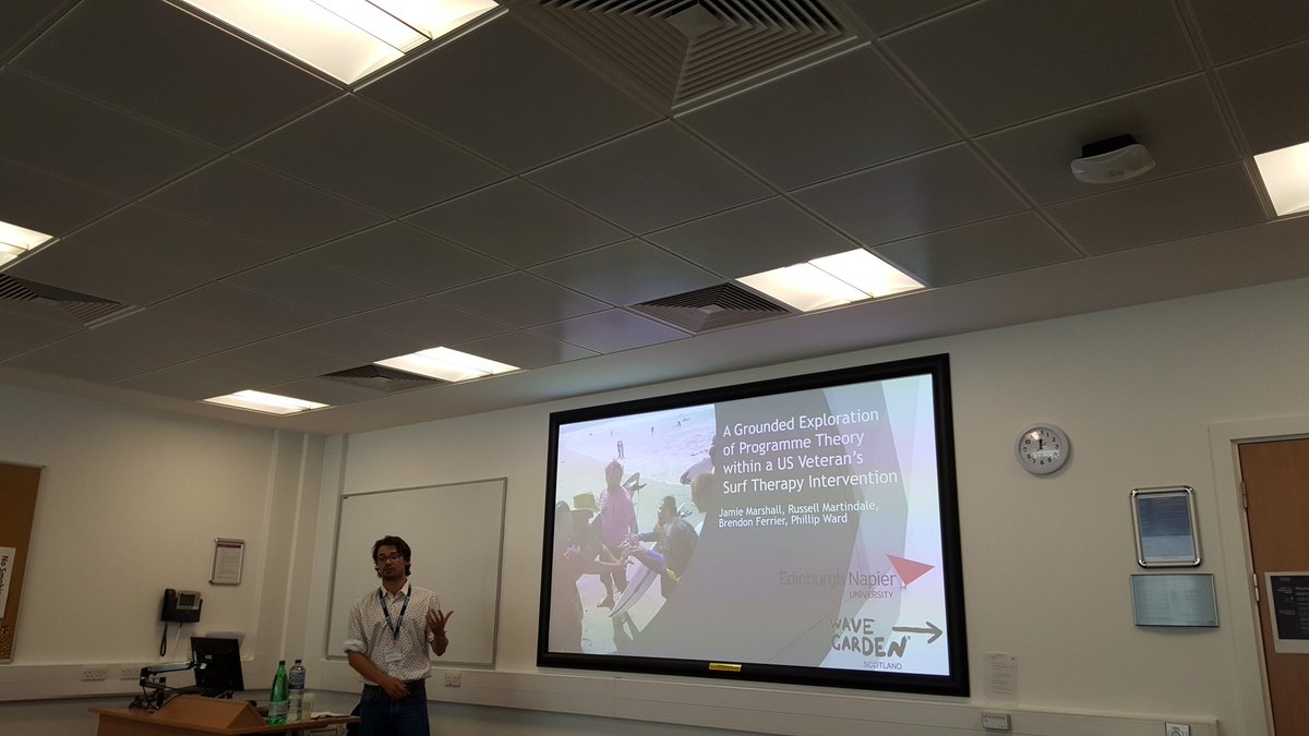 First presenter from @EdinburghNapier @ENUSportScience @ENUApplyScience is Jamie Marshall presenting his findings on #surftherapy in US veterans. #BASESStuConf2019 #groundedtheory @BrendonFerrier