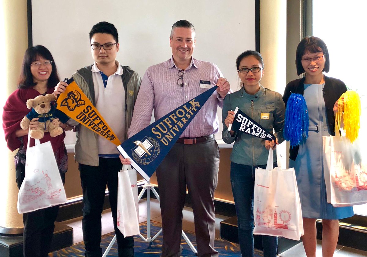 INTO_Suffolk's tweet photo. Tim presenting prizes to the winner of Day 1 Group Training in Hanoi, Vietnam. #INTOSuffolk #suffolkuniversity https://t.co/6zjoBCjiJs