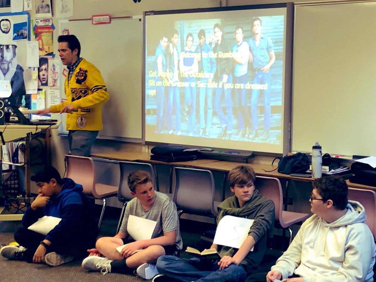 WebberMS's tweet photo. Ss &amp; teachers getting into character for the Outsiders rumble. This classic novel continues to be relevant &amp; engaging! TY @se4realhinton @KatieSovine @Emjay460 @cassyoco #webberReads #theWebberWay #PSDproud https://t.co/UtFW1CKNf6