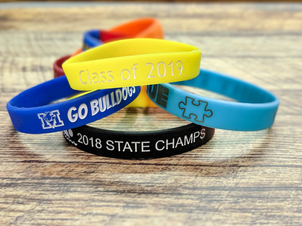 wristco's tweet photo. Does your high school have #CustomWristbands for your graduating seniors yet? #RubberBracelets are the way to go! Add your class year and mascot using our online designer tool here: https://t.co/lk7tStknyk #WristbandResources #StudentWristbands https://t.co/vS5DnjiHAB