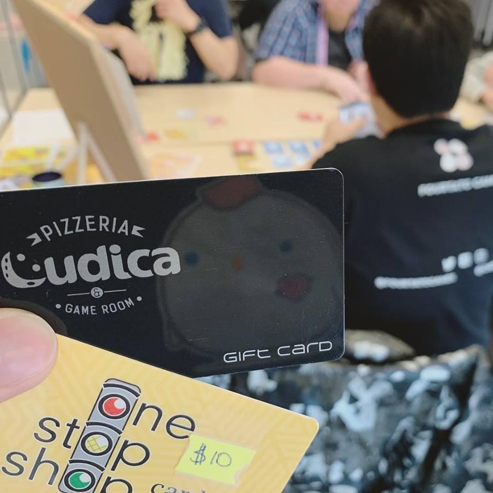 FourtatoGames's tweet photo. We were at the Meeple Leaf Con and won 2 gift cards. One is for @PizzeriaLudica and the other is for @onestopshopcard.
I especially like the shinny black Ludica card reflecting the #chicken from my t-shirt π
#meeple #meepleleafcon #pizzeria #tshirt #gift #card #boardgames https://t.co/7BaBecFWWh