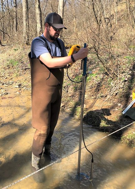 IWSS Graduate Research Assistant Zack Heck completes a cross section in the West Run Watershed as part of his Master's project. <a href="/wvudavis/">WVU Davis College</a> <a href="/researchwv/">STaR Division</a> <a href="/WVHEPC/">WV HEPC</a> <a href="/WVUGradEd/">WVU Grad Ed and Life</a>