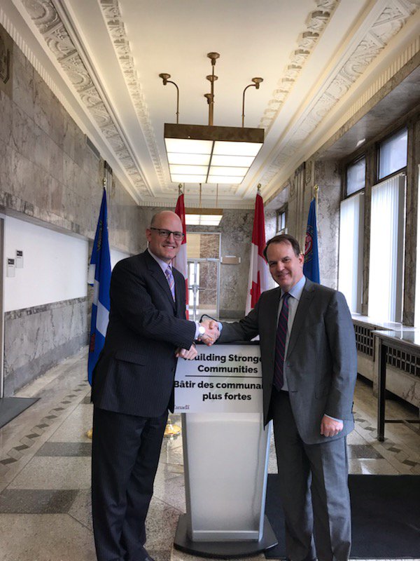 drewdilkens's tweet photo. I joined @stevenmackinnon to announce that @CityWindsorON will purchase the iconic Paul Martin building from the federal government for $1, and temporarily house the Central Branch of the @WindsorPubLib within a section of the building. 1/2 https://t.co/eD99qg1lJu