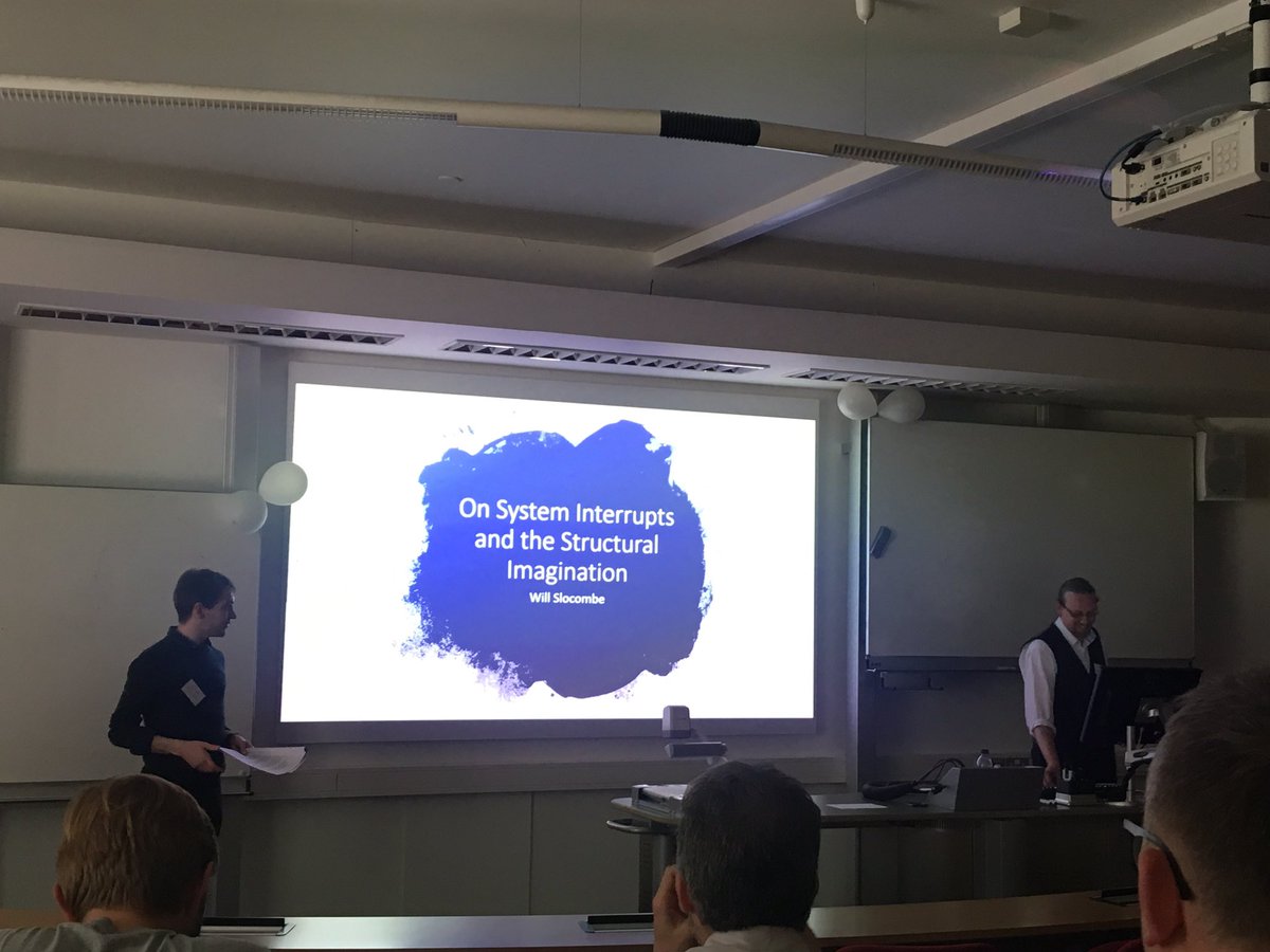 literaryla's tweet photo. Organiser @ArchWeird introduces @GlitchGhosts keynote speaker, Will Slocombe, finishing up what has really been an insightful day of great papers with a talk titled ‘On System Interrupts and the Structural Imagination’. #glitchesandghosts https://t.co/IBH6lSDTLc