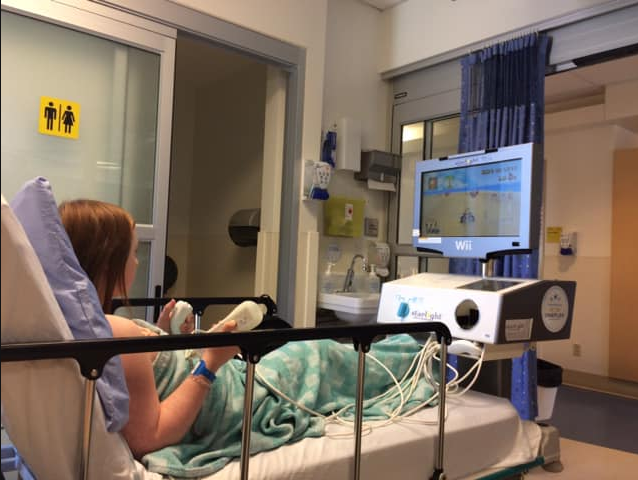 StarlightCanada's tweet photo. Having a Starlight Fun Centre® around keeps Starlight teen Emily in good company, as she's often in and our of her local hospitals a lot. She can either watch a DVD or play the latest @Nintendo games! 🎮 #FunCentre #BC https://t.co/GnXsNf3PSn