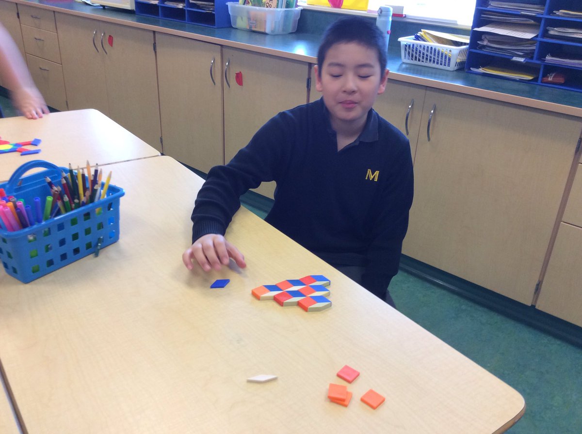 Creating an abstract representation of something, using only geotiles. Connecting math to our #PYPX  #5RB #Mathmanipulatives #transdisciplinarylearning @MsTamaraNemeth