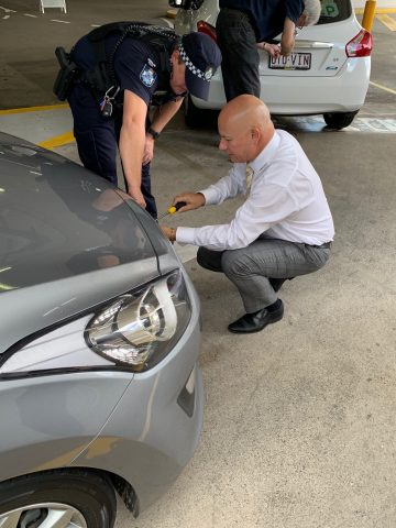 QldPolice's tweet photo. On Tuesday, Carina Police helped an eager line of locals to fit one-way anti-theft number plate screws to their vehicles! Police were also able to speak about road safety in the lead up to the Easter school holidays 🛠️👮‍♂️👮‍♀️ https://t.co/6dYSyE7kfO https://t.co/AM9jfZQQqv