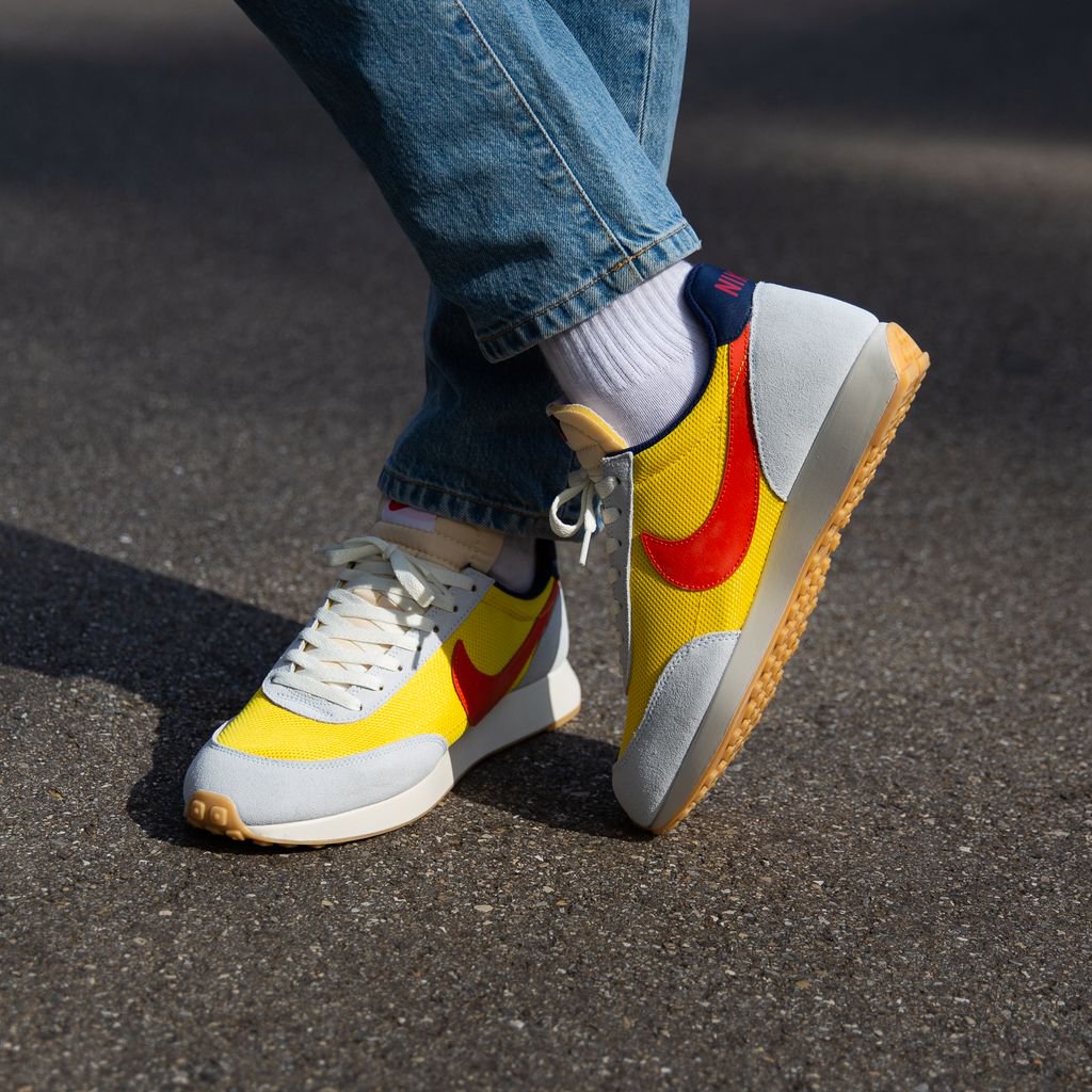 nike tailwind yellow orange