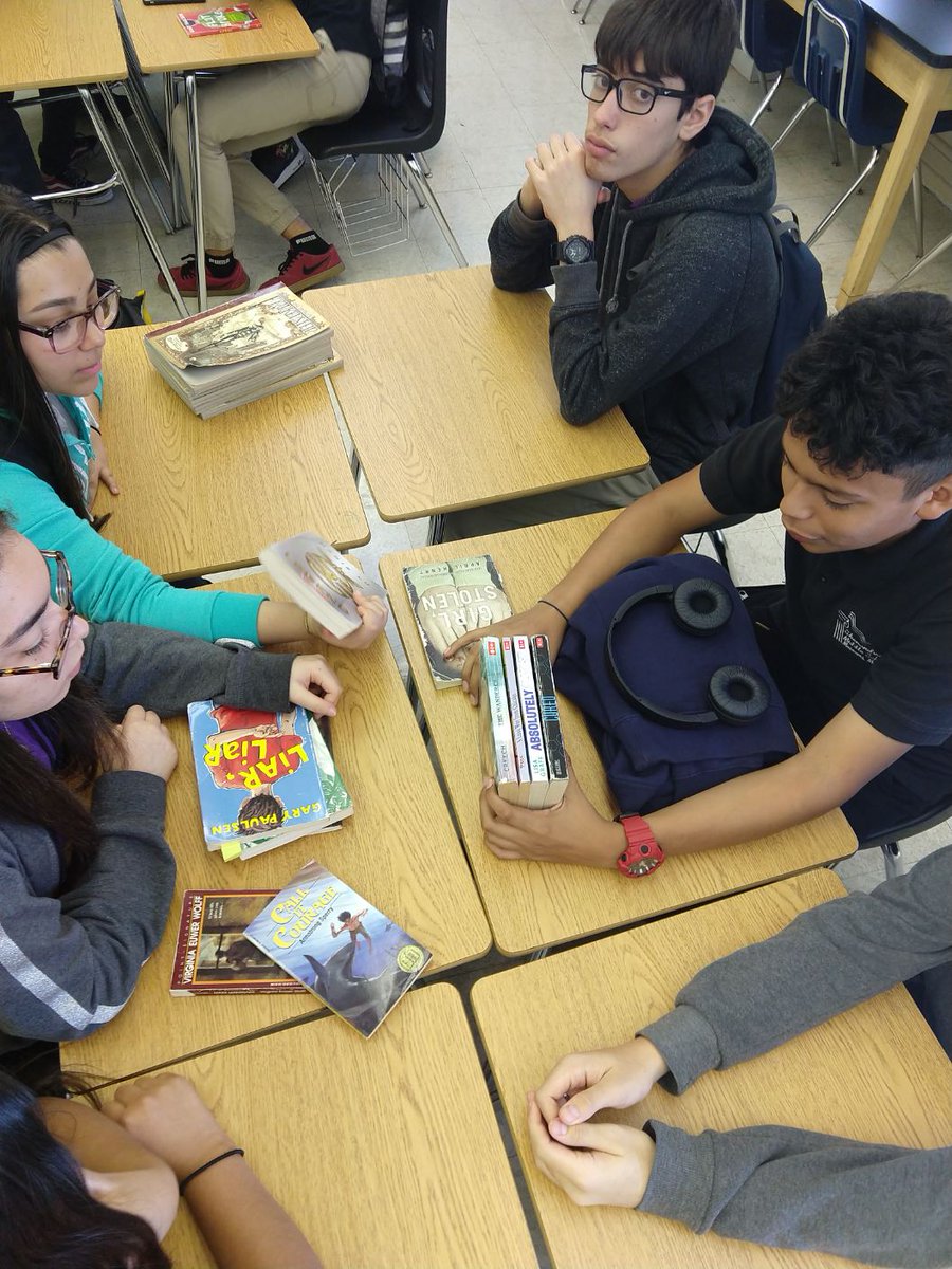 ShenandoahMS's tweet photo. SMS students are really getting into the process of creating poetry using only the titles of books. Spine poetry has been a big hit! #springintopoetry #SMSELA @MDCPS @MDCPSCentral @MiamiSup @MDCPSREADING https://t.co/KDdRUnpJP3