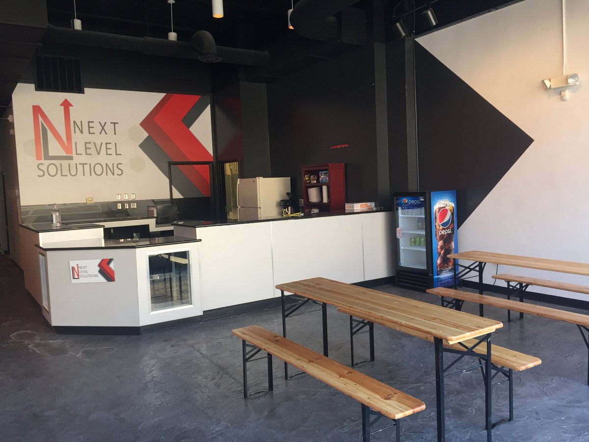 The new break room at headquarters has really come together in the last week. Newest addition: picnic tables, where LOADS of #CollaborativeLearning will take place! #NLSNow