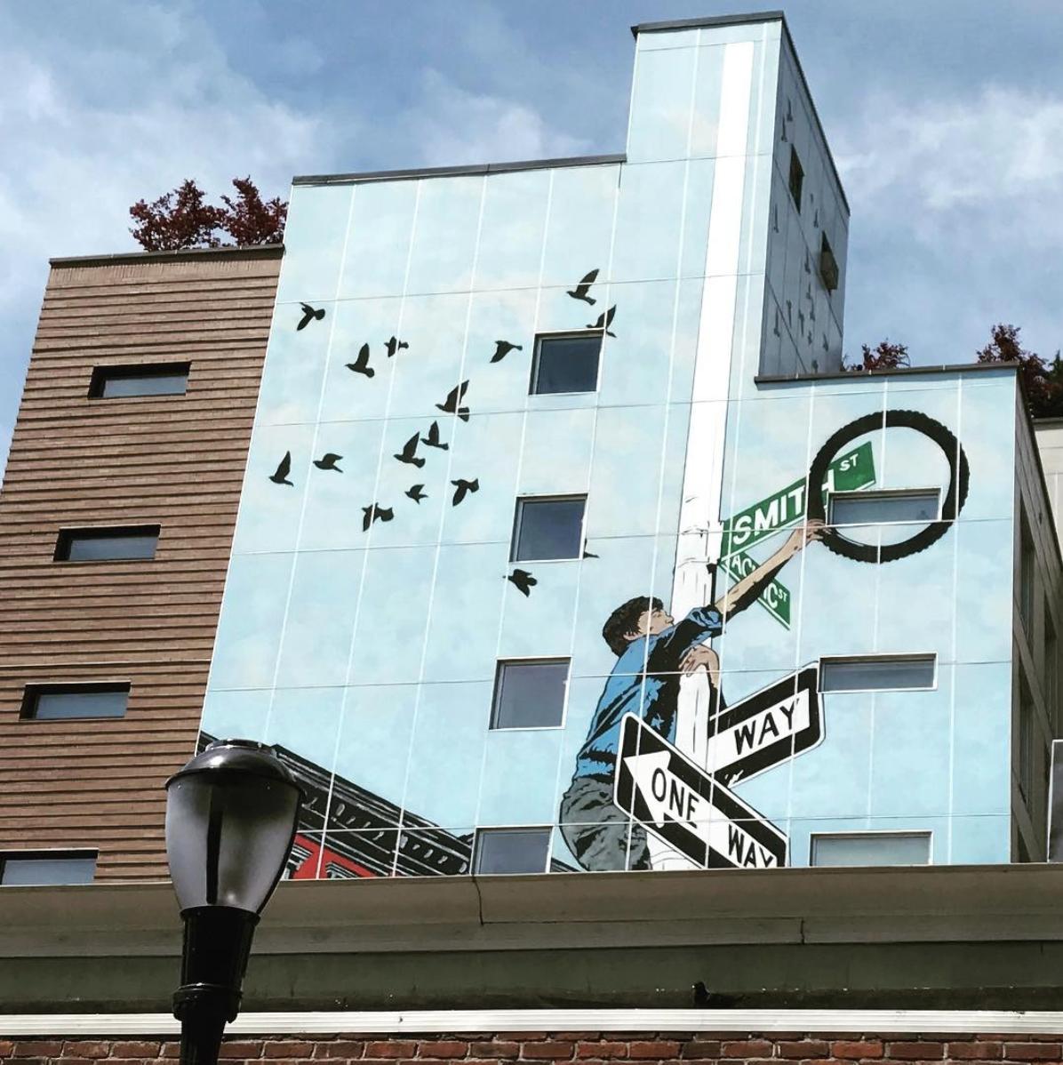 Look Up! Take a stroll around the gorgeous Brooklyn neighborhoods to see eye-catching murals such as this one. Tag the artist @! 🎨 ❤️  #ThisIsBrooklyn #BrooklynArtists #Murals #HELLOCreatives