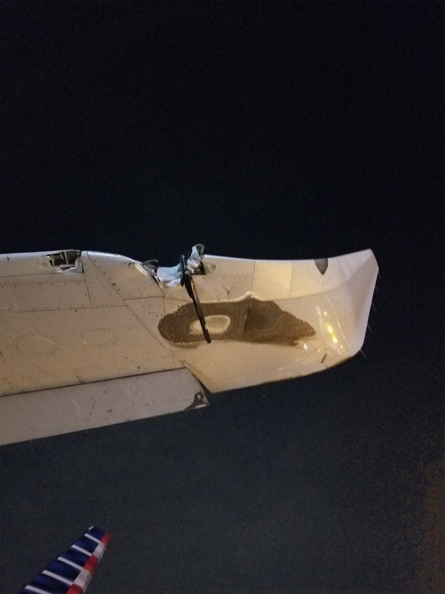 krisvancleave's tweet photo. #breaking New pictures obtained by @CBSNewYork show some of the damage to @AmericanAir flt 300 including what was described as a runway “edge light” embedded in the damaged wing. The plane flew for 28 minutes with that light stuck in the wing! More on the @CBSEveningNews tonight https://t.co/owL4peOxgv