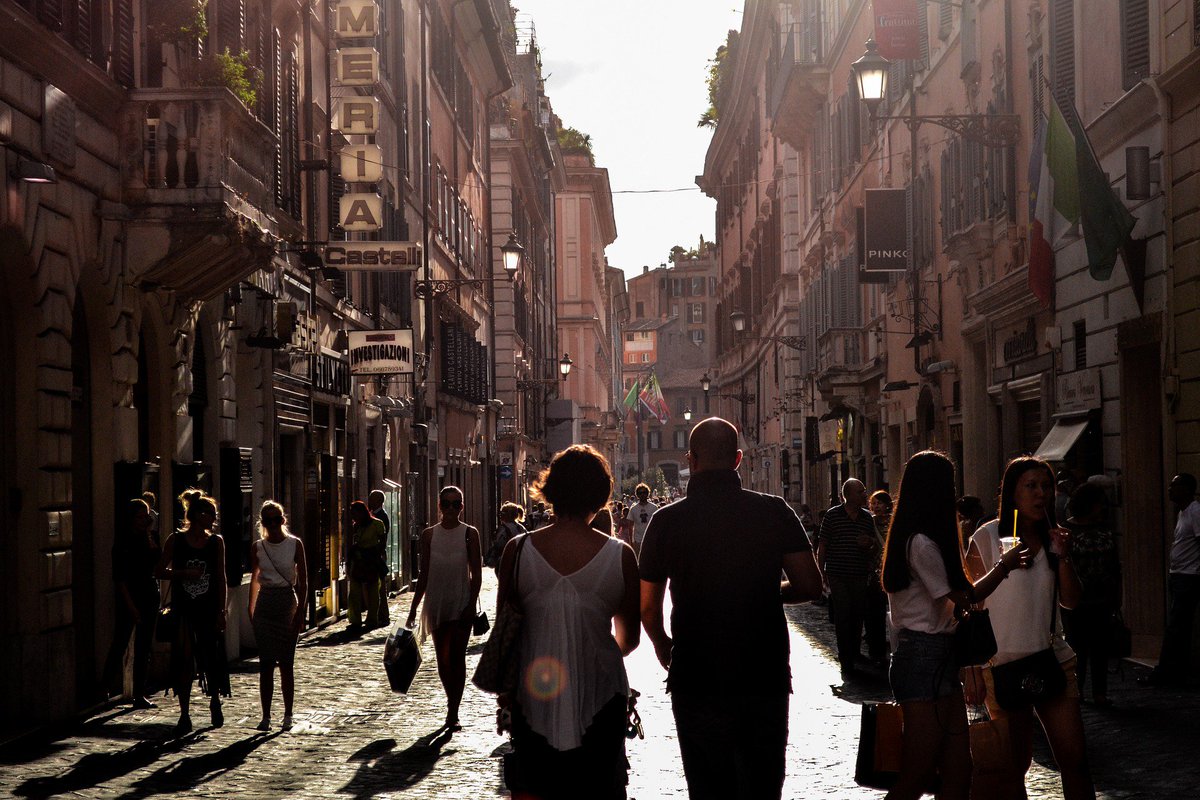Street scene with people in an Italian city