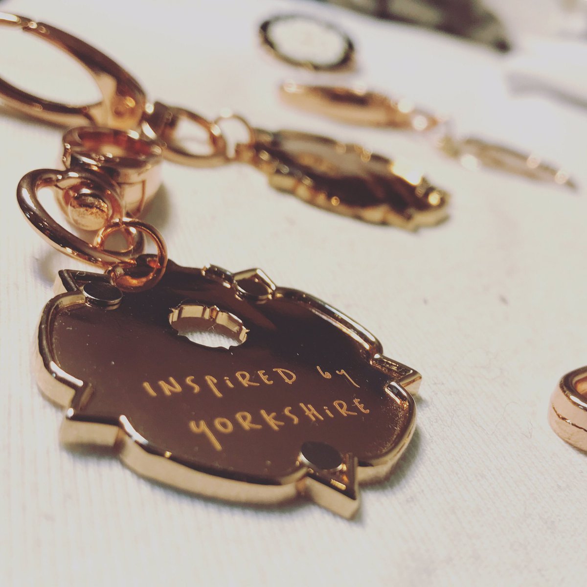 We love getting creative both with our designs and in the detail. Like fixing the tiny neodymium magnets 🧲 to our Magcessory backing plates #inspiredbyyorkshire #rosegold #mixandmatch #fashionaccessories #bagcharm #keyring #british 🇬🇧 #design #yorkshiresayings #whiterose #sheep