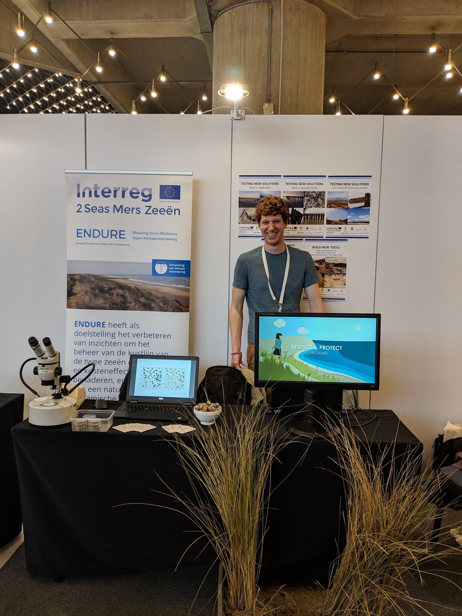 2seasEndure's tweet photo. Ruben is overjoyed to be holding the stand for #Endure at the @Interreg2Seas Mid-Term event. Come and visit our stand. We have chocolates. While stocks last. #easteregghunt #interreg2seas #resilientdunes #resilientpartners #crossbordercooperation https://t.co/QgWR468TSV