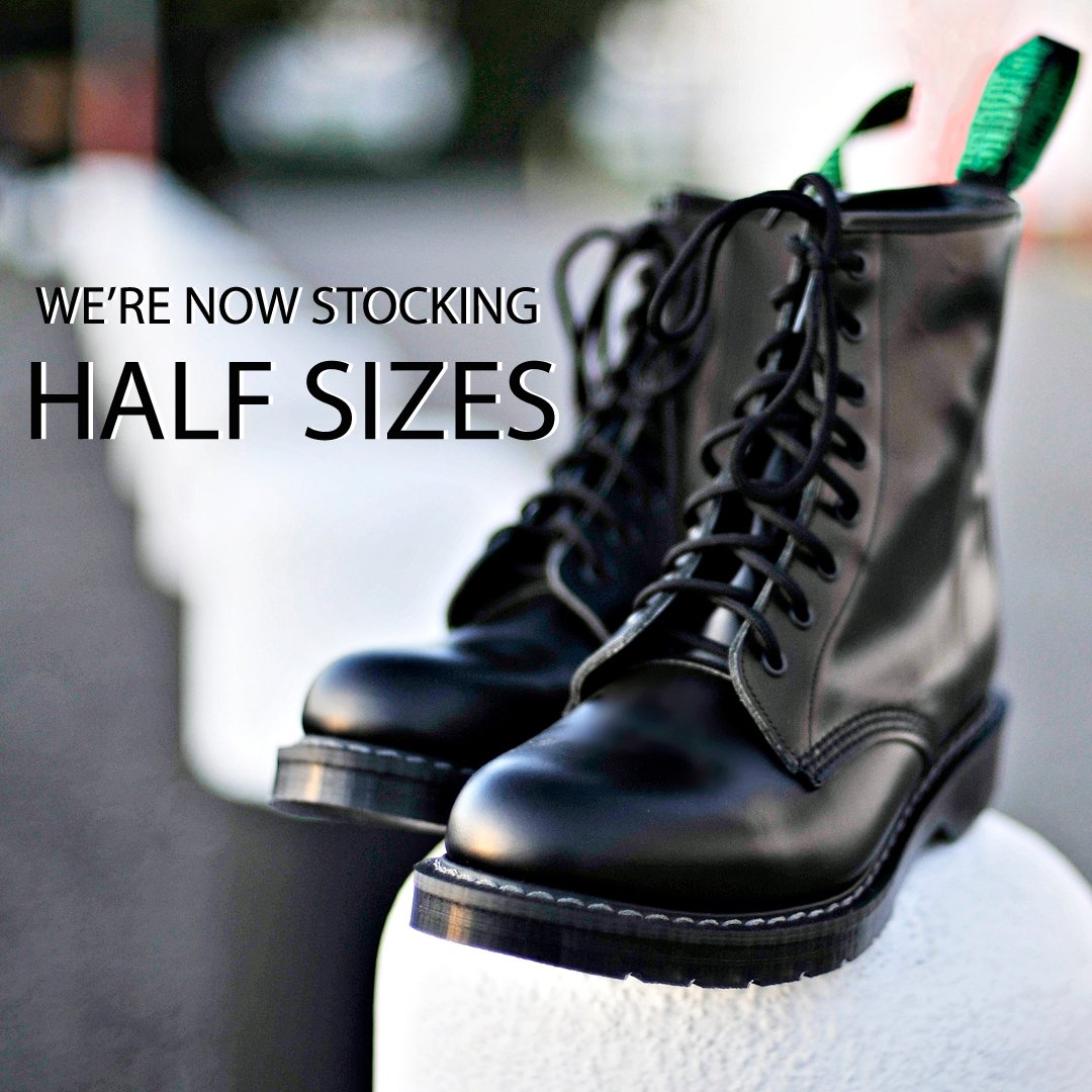 black greasy 8 eye derby boot