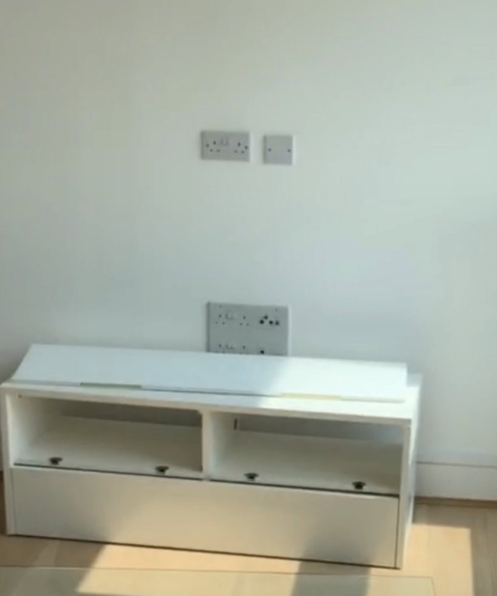 johnrahers's tweet photo. The top points are for my wall-mounted telly.. No TV stand required or desired. What would YOU use to hide the ghastly bank of idle low-level points?! (Removing them isnโt an option) #helpjohn https://t.co/fGEn29lGNV