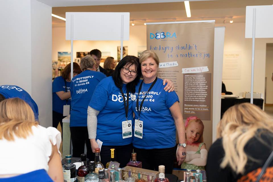 debraireland's tweet photo. An incredible €18k was raised for us at the @ginexpdublin! Thank you so much to Ally, Julie and Katie for choosing us as #charitypartner for the second year running. To our volunteers and to all those who supported us, you are our superheroes! #ginexpdub #cureEB #doitforDEBRA https://t.co/GJPKQ9zfVw
