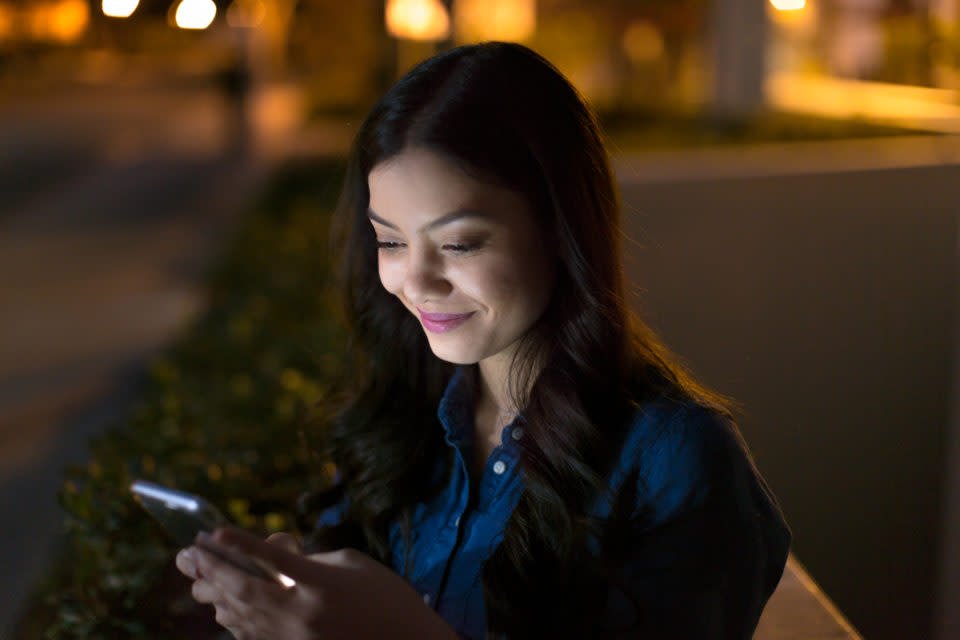 Student using her smartphone.