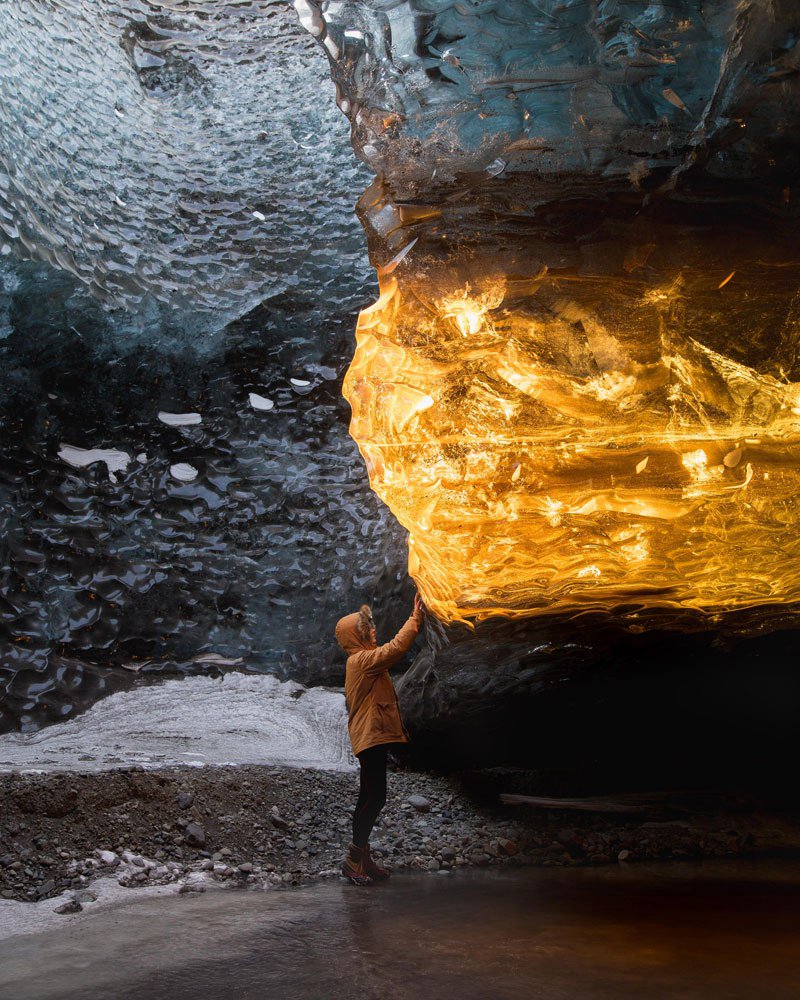 Travel photographer Sarah Bethea captured this breathtaking photo last winter in Iceland of a setting sun’s golden rays entering an ice cave &amp; turning a section of the ice amber. The picture was taken at the Treasure Island Caves, Vatnajökull glacier buff.ly/2NZ5d8u