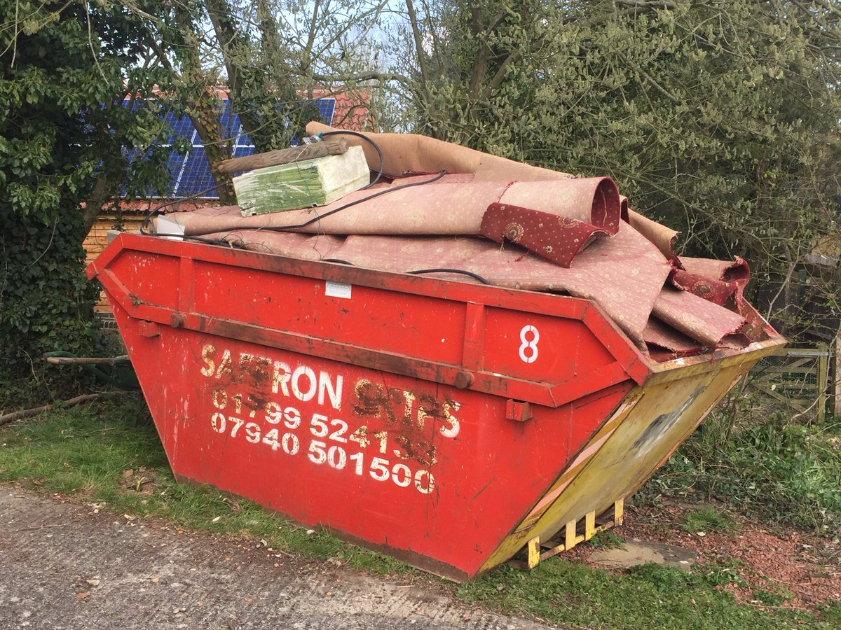 Helionspub's tweet photo. 132 volunteer hours over three weekends = full skip &amp; clean garden. New tables full sun in Helions this Saturday. Join us between 4-9 pm. Superior bangers, burgers &amp; local ale.  @PlunkettFoundat @EssexYFC @wscBeer @onehaverhill @PubistheHub_uk @NethergateBrew @Essex_CF @colCAMRA https://t.co/gem7JrbRfW