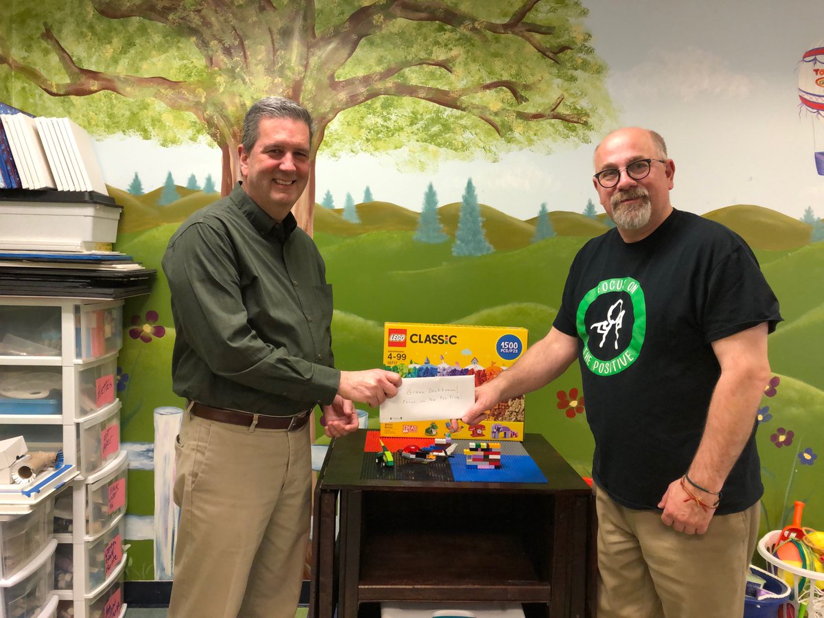 AdvisorsIB's tweet image. Peter Kelly, presents a contribution to Tim Stowell, of the Green Drakkoman Foundation, facebook.com/GreenDrakkoman/  as part of our quarterly “Blue Jeans for Charity” giving campaign.