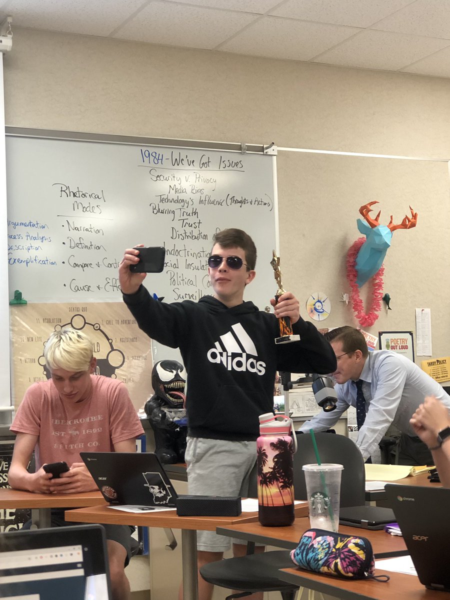 carlywoodward55's tweet photo. “vlogging” his victory. Sunglasses stay ON during the debate. unsportsmanlike conduct or pure joy? tune in tomorrow for another showdown #debatelyfe😎 @MrJenkinsENG @gracefishy_ https://t.co/3FoWdgkl1F