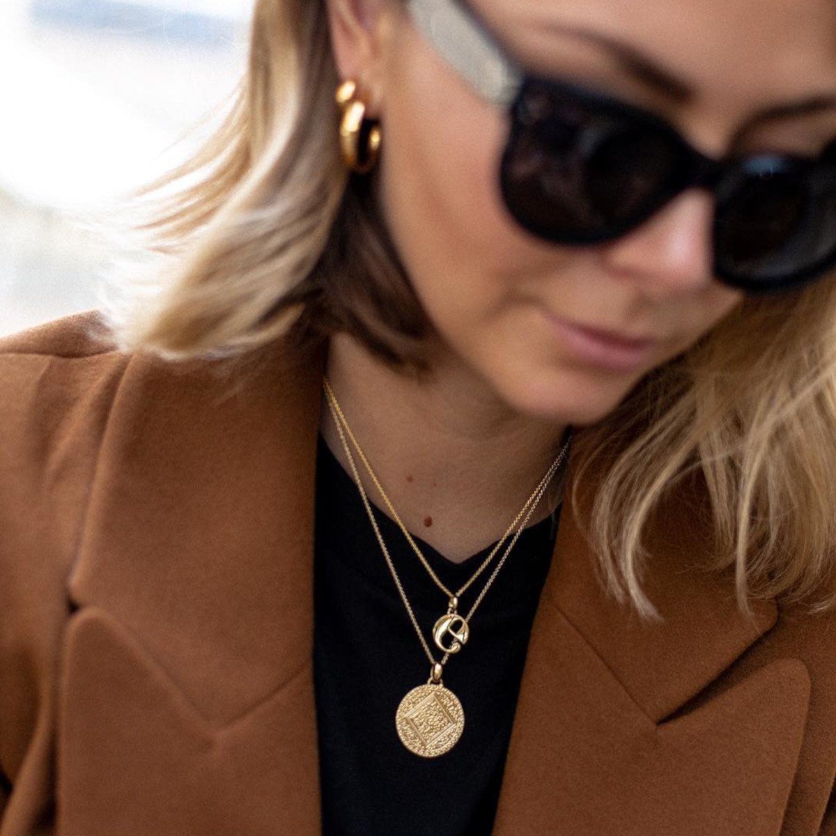 CASH IN 
It doesn't get bolder, or golder than the Marie - our iconic coin silhouette. We love the way <a href="/Ems_EJSTYLE/">Emma Hill</a> styles hers with a personal touch. Who's your style inspiration? Tag them in the comments below 👇 #Repost

Shop Emma's look > bit.ly/2GkgdLD