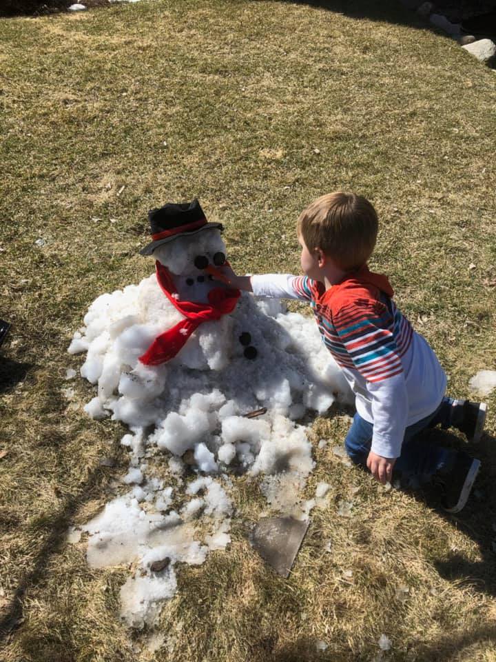 Matt_Brickman's tweet photo. Kathleen Heimermann sent along this pic "Trying to save his snowman in the almost 70 degree weather! He’s a little heart broken!" 😢 https://t.co/SsNXL5Irz4