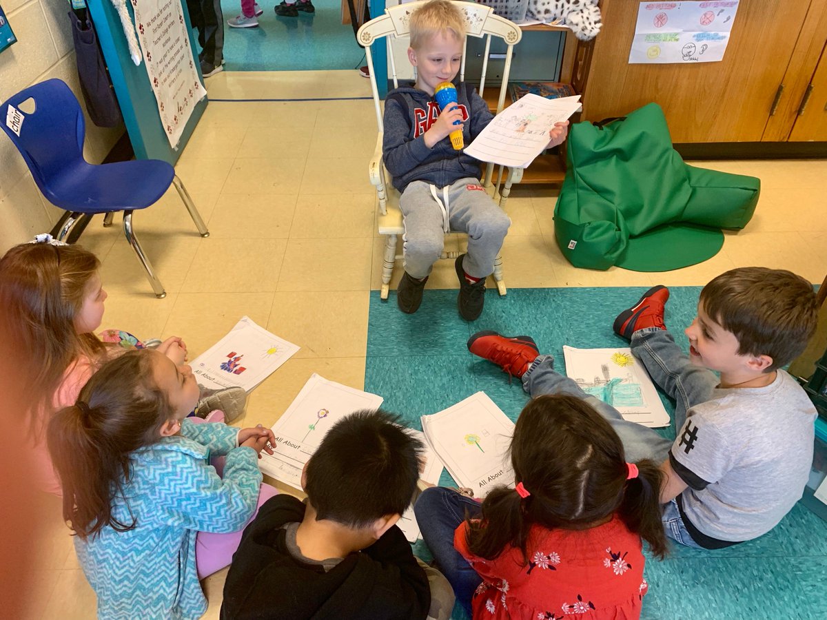 PS91Q's tweet photo. Kindergarten embraces their “All About” Writing Celebration! Sitting in the Special Author Chairs & reading loud and proud into the microphone! #tcreadingandwriting #tcrwp #huskies #pack91 #onepackmanypawprints @TCRWP @DOEChancellor @missskbee @missalissanyc @District24Team https://t.co/r7vPISym6G