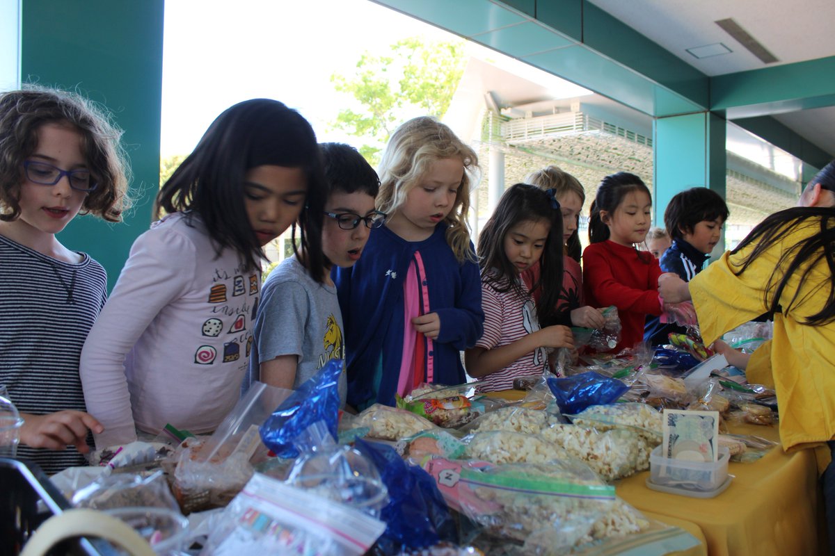 asijessc's tweet photo. Plenty to choose from! Kg–Grade 2 students carefully make their 2 selections on the first day of our annual #BakeSale. #donations #fundraising #elementaryschool #studentcouncil https://t.co/4NM6mHGT3i