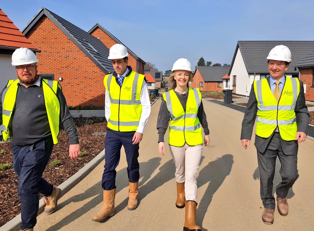 trussliz's tweet photo. With @TonyAbel and team talking about cutting red-tape to get more great homes built, welcoming new residents to Swaffham and trying out their new carbon free eco-bikes. #moregreathouses #norfolkbuilders #greendevelopment #YIMBY https://t.co/cLHXzY8jUD