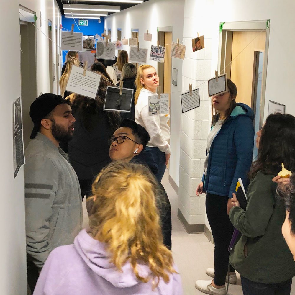 What a great way to end the semester! Students from #Laurier's Languages and Literatures program put their Spanish language skills into practice at the 6th annual Postcard Exhibit last week! @LaurierArts @LaurierTeaching