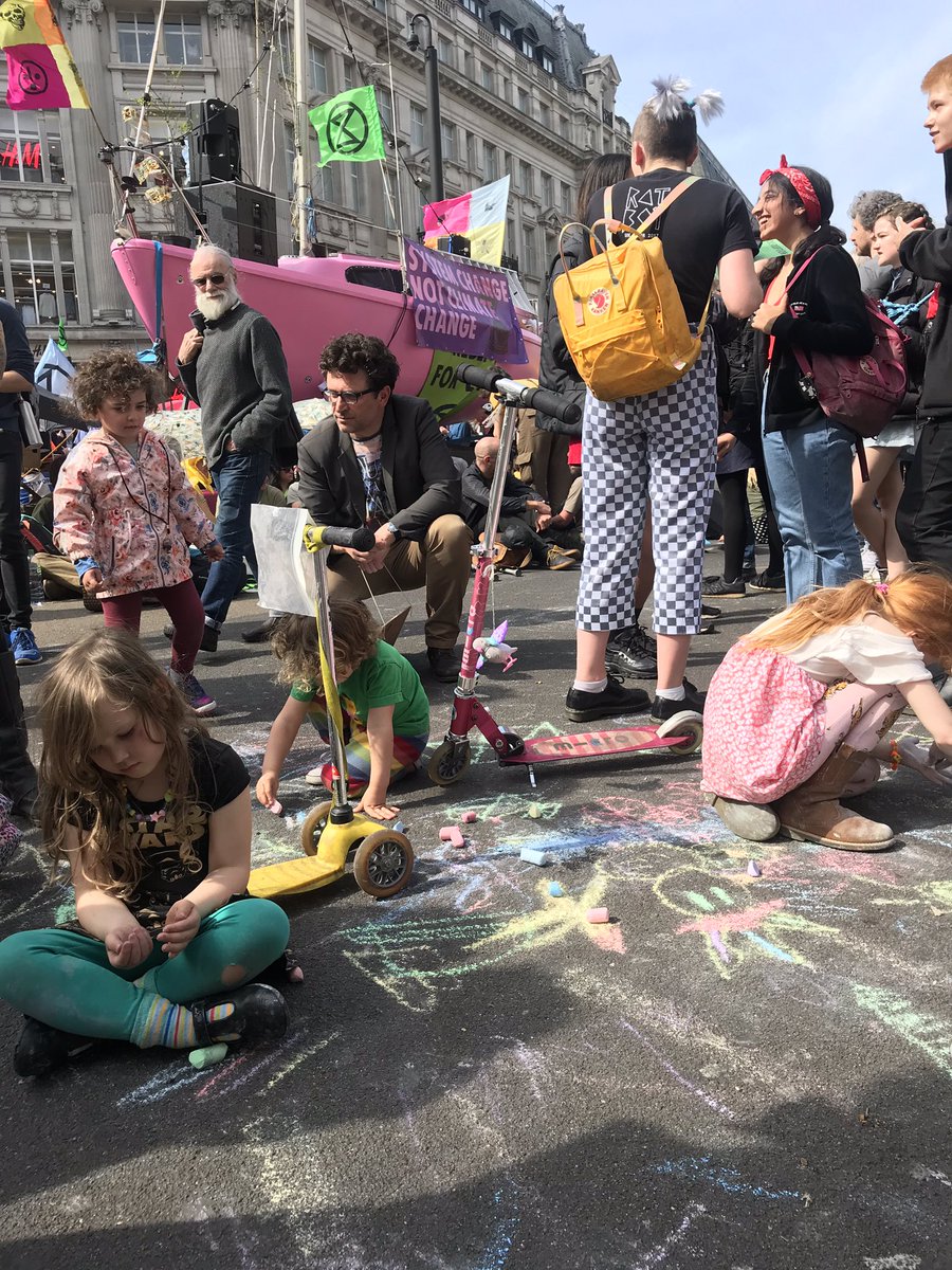 PrimeNumero's tweet photo. Wonderful #ExtinctionRebellionLondon #ExtinctionRebellion activity at #OxfordCircus. 

Still #arrests happening on the other side #TellTheTruth boat, but #children are a #RiskAssessment issue to make a #safe arrest on the opposite side.

A wonderful #Symbient #ProtectionCircle https://t.co/k3zBjxE7vu