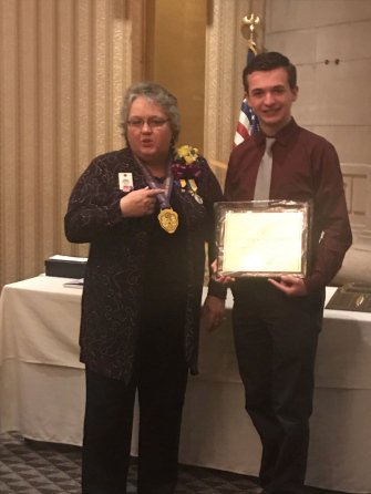 Leo Patrick McCool, a senior at Old Forge High School was awarded Lions District 14 H Leo of the Year Award. Cathy Metschulat presented the award at the district’s dinner on April 7.