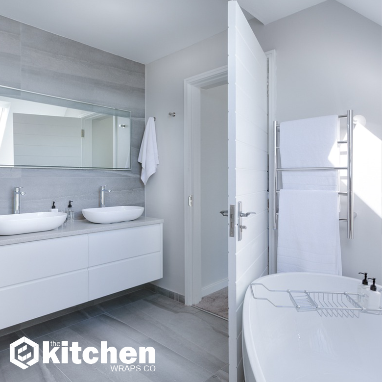 We can wrap your bathroom too! From tiled areas to cabinets in a variety of finishes from matte or gloss solid colours to stone and marble effects. Visit thekitchenwrapsco.com